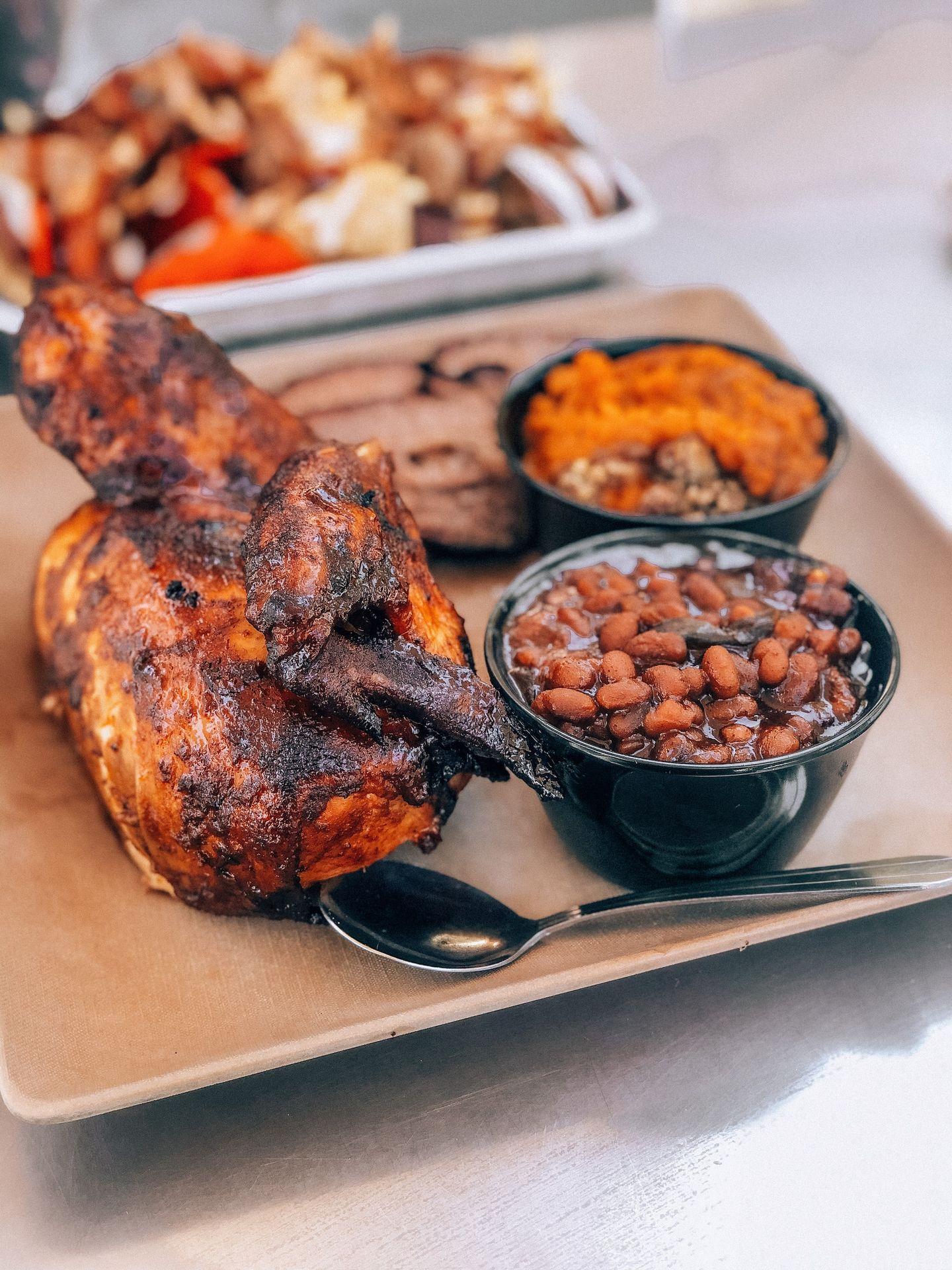 roasted chicken on white ceramic plate