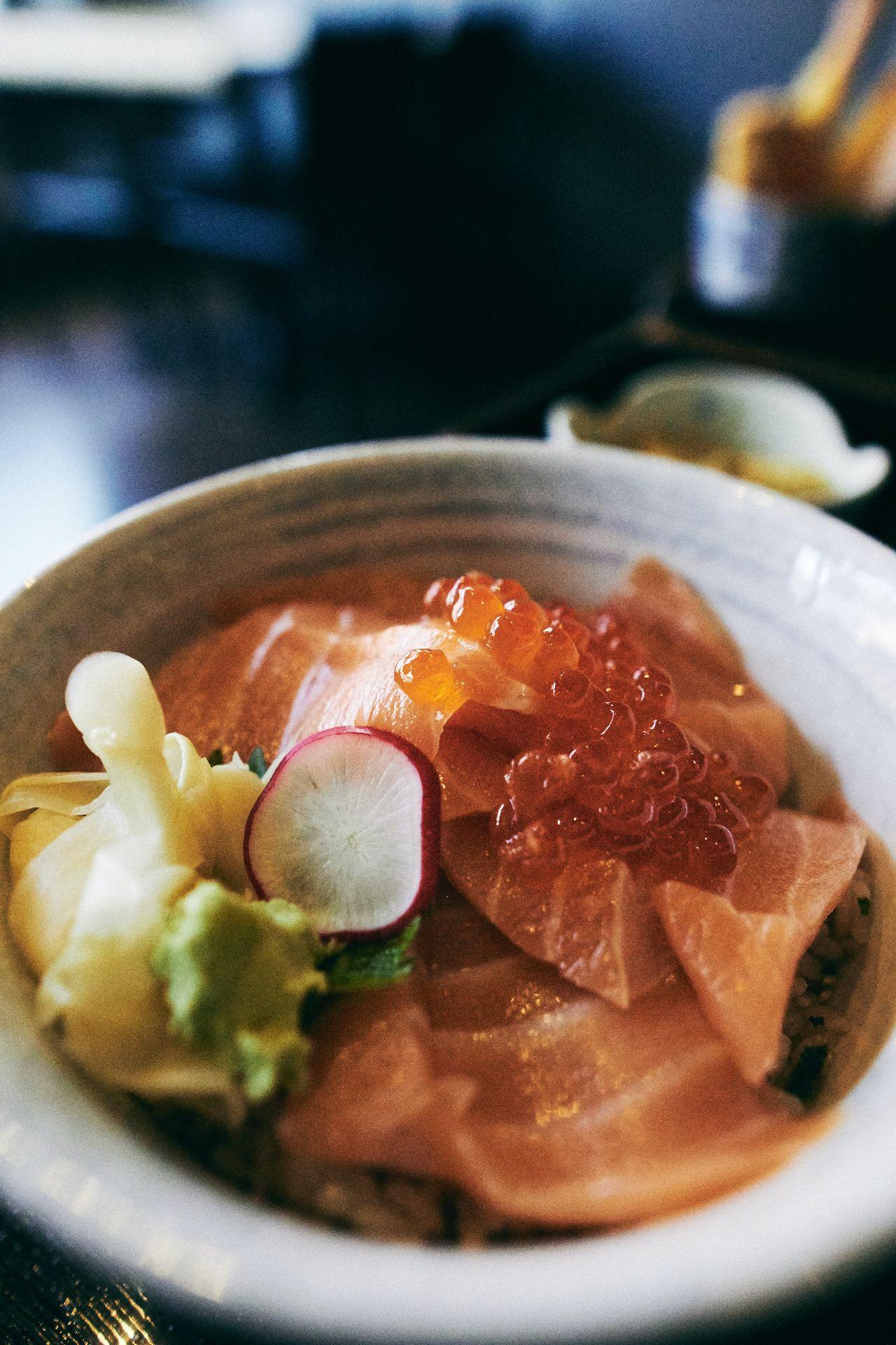 sliced tomato and cucumber in white ceramic bowl