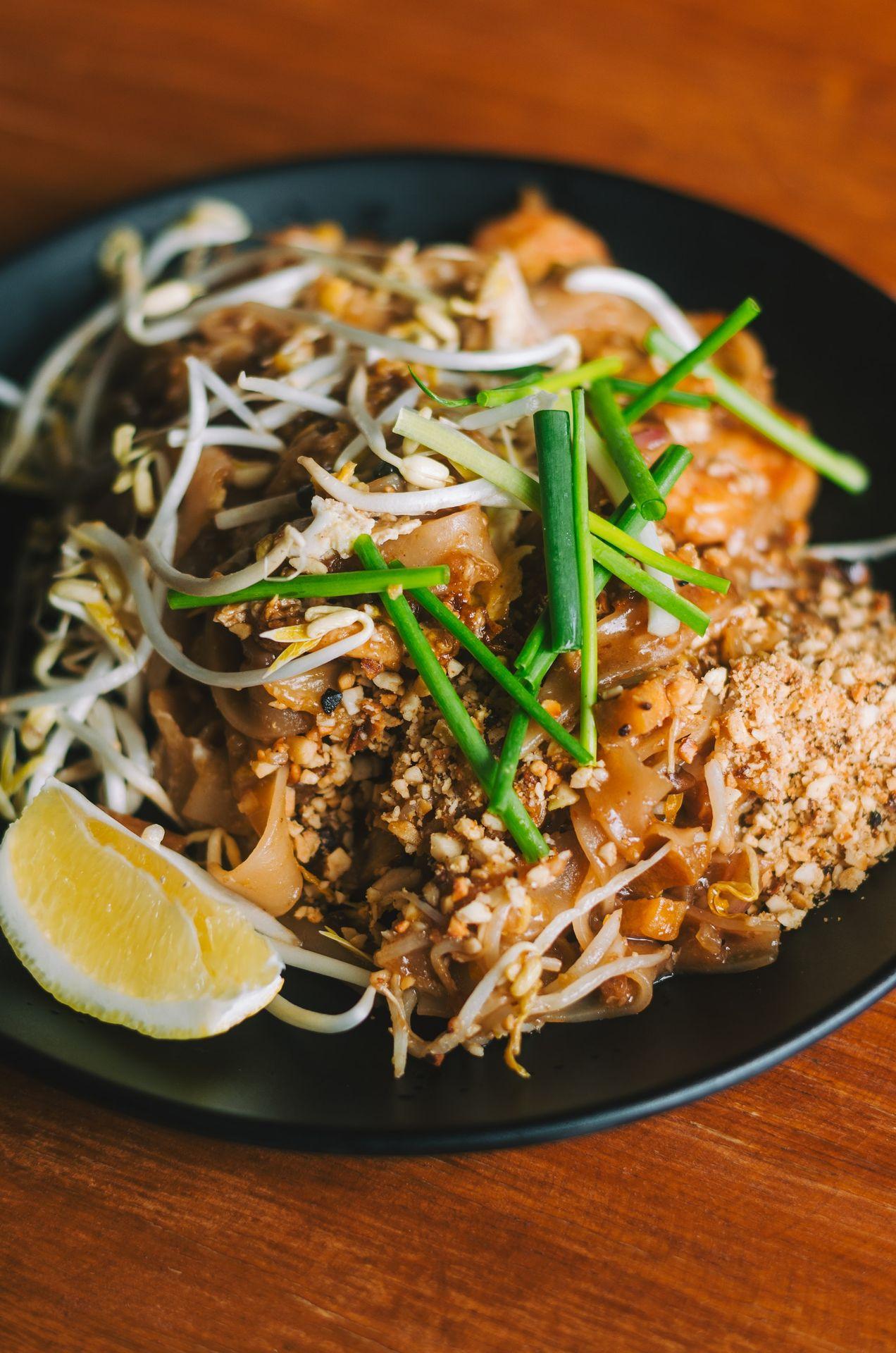 a plate of food on a wooden table