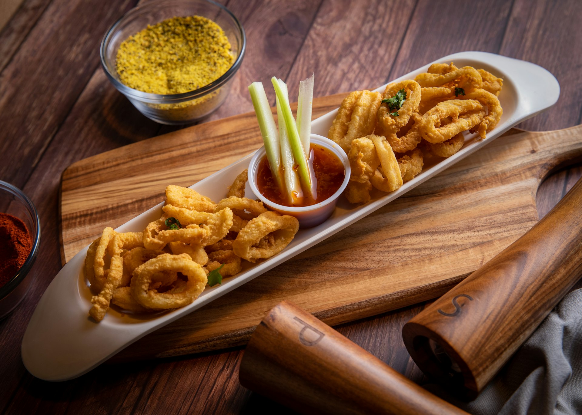 fried food on brown wooden tray