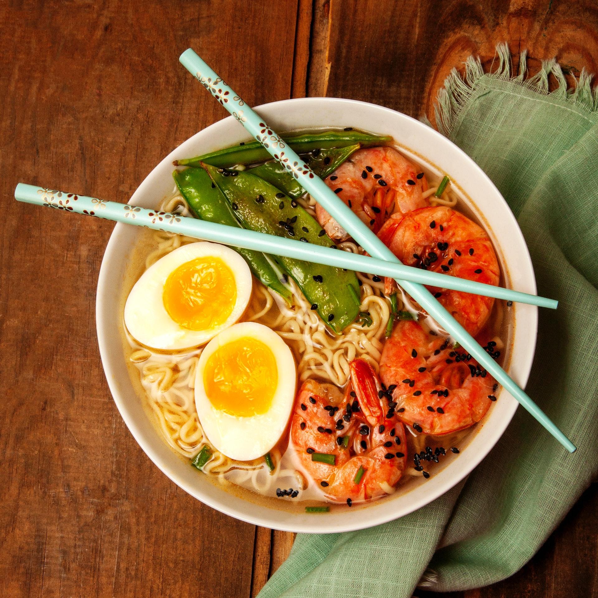 round white bowl with ramen and egg