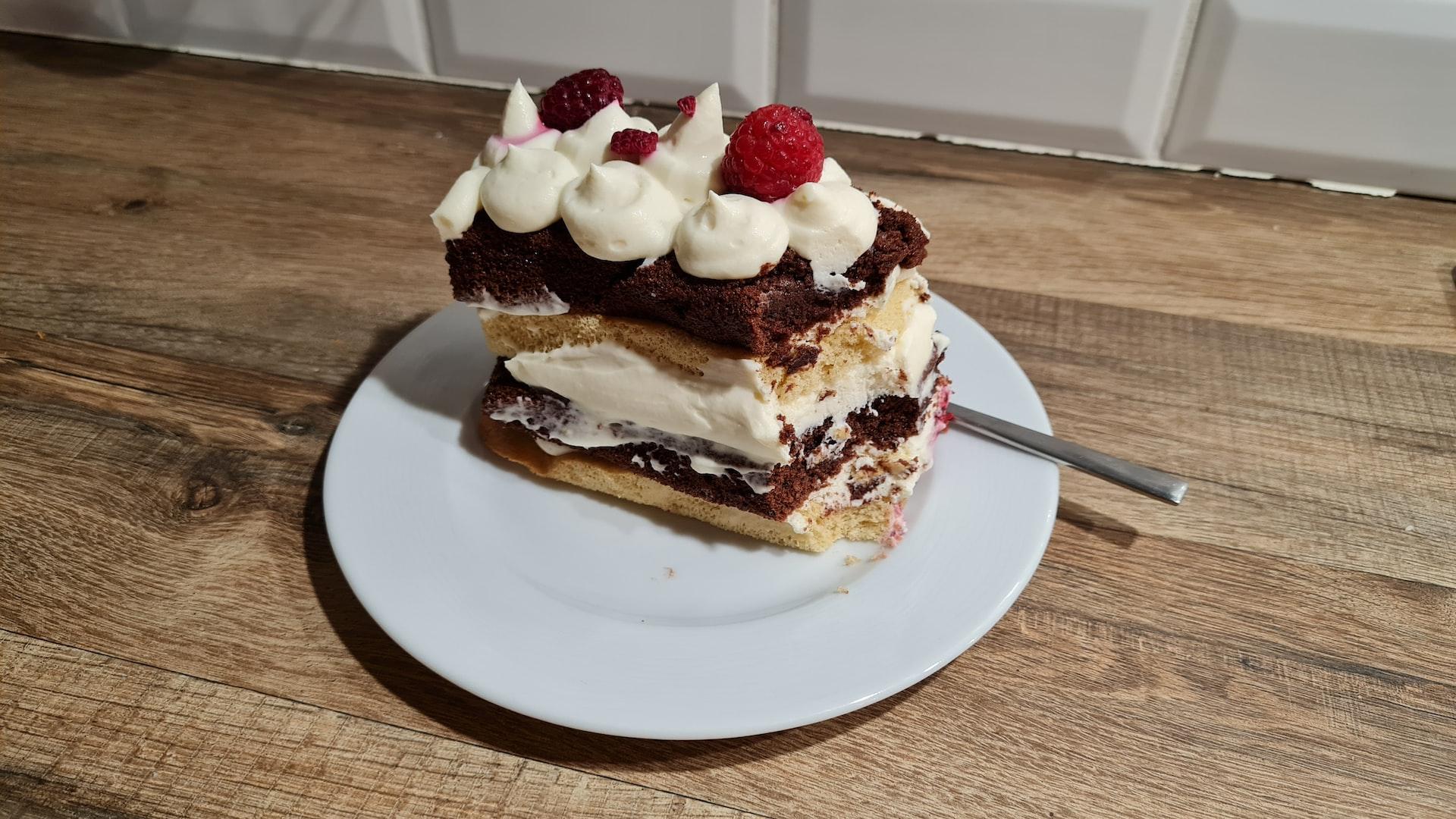 a piece of cake sitting on top of a white plate