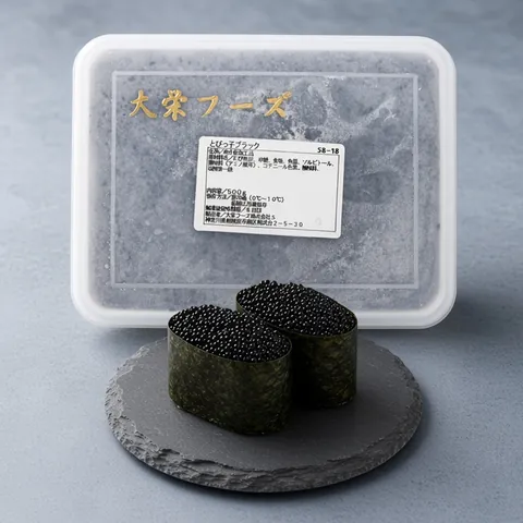 Two black tobiko gunkan maki battleship sushi beside a Daiei black tobiko tray