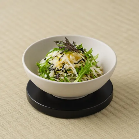 Daikon and mizuna salad with shiso and nori dressed with ponzu