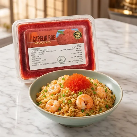 Egg fried rice with prawns and spring onion topped with red masago in front of a GGFT red masago tray