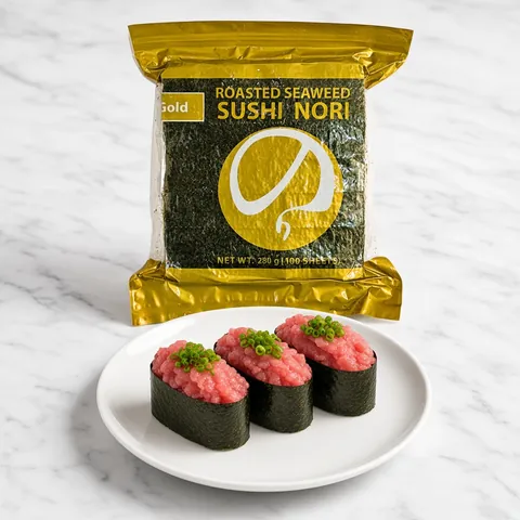 Negitoro gunkan maki with minced tuna and spring onion in front of a GGFT Gold sushi nori bag