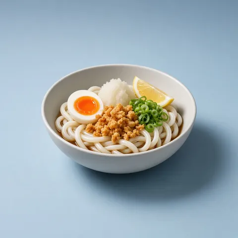 Chilled bukkake udon with grated daikon, soft egg and tempura bits